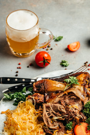 eisbein with sauerkraut and beer, German cuisine, Roasted knuckle of pork,の写真素材
