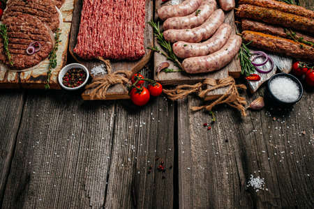 Raw meat products, different parts of the body. minced beef meat kebabs, pork, beef, chicken. banner, menu, recipe place for text, top view,の写真素材