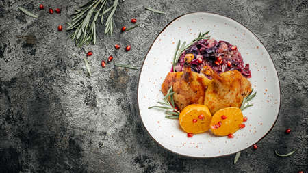 Portion of roast duck leg red cabbage homemade. banner, menu, recipe place for text, top view.の写真素材