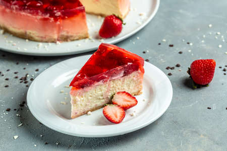 A piece of strawberry cake with berries jelly, jam on plate. banner, menu, recipe place for text,...