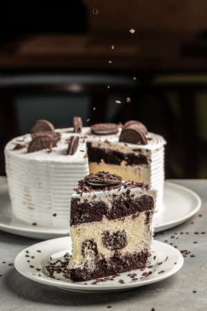 delicious sweet dessert piece of cheesecake. Creamy cheesecake with chocolate cookies and cream...