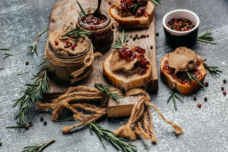 Homemade duck liver pate with red onion jam. Gourmet appetizers, Assorted Italian appetizer bruschetta. banner, menu, recipe place for text, top view.の写真素材