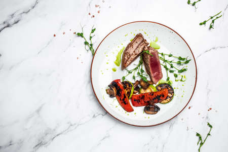 Grilled tuna with spice. tuna steak with vegetables. tuna grill seafood fried barbecue fish grilled. diet vegetarian fish dish, Ketogenic, keto or paleo diet lunch, Healthy food trend. top view,の写真素材