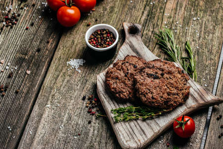 Grilled Beef burger patties. Meat cutlet. Black background. top view. copy spaceの写真素材