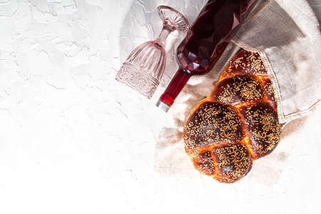 The concept of oriental cuisine. National Israel homemade challah egg bread and sesame, before being cooked, raw dough. Shabbat preparation.の写真素材