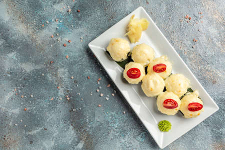 Japanese traditional baked roll with fish and sauce, Restaurant menu, dieting, cookbook recipe top view,の写真素材