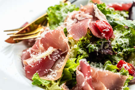 Salad with Prosciutto, ham and grapefruit jamon, salad mix, grapefruit, cherry tomatoes, parmesan...