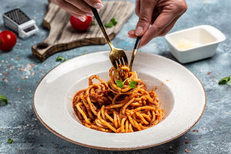 Pasta with meat, tomato sauce and vegetables, Italian pasta bolognese. banner, menu, recipe place for text, top view,の写真素材