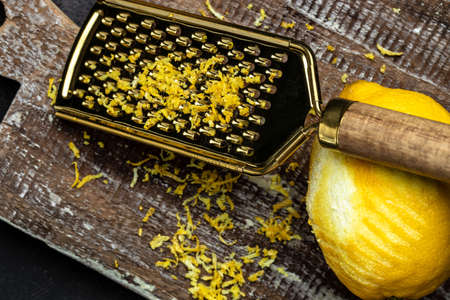 Grater peel and lemon zest Ready to Cook, vertical image. top view,の写真素材