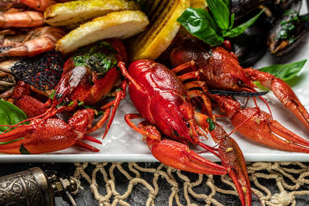 A plate full of cooked crayfish, Traditional Swedish cuisine.