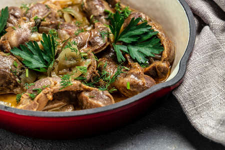 Stewed chicken stomach, Traditional Korean spicy chicken gizzard with onions, garlic, chili and...