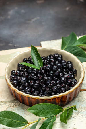 Maqui berries Superfoods antioxidant of indian mapuche. vertical image. top view. place for text.の写真素材