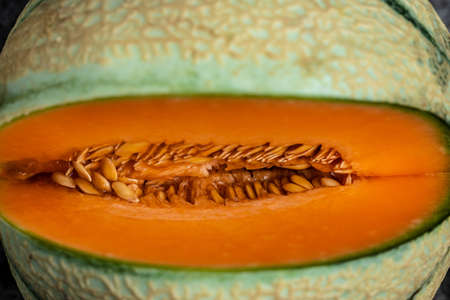 sliced cantaloupe melon. Raw Organic Tuscan Melon Cantaloupe isolated on white background, banner,...