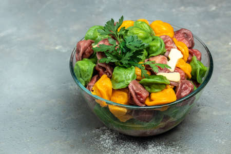 Uzbek food Manti or dumplings made from multi-colored dough. Homemade Uzbek dish. The concept of oriental cuisine, banner, menu, recipe place for text, top view,の写真素材