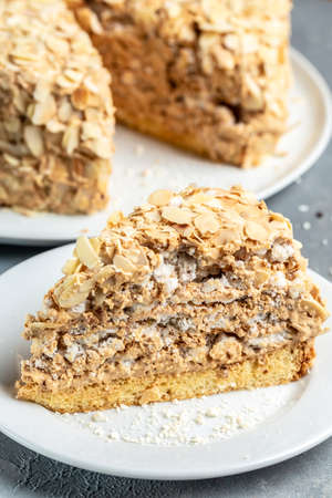 Meringue hazelnut cake with chocolate cream, Food recipe background. close up. layered cake,の写真素材