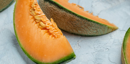 sliced cantaloupe melon. Raw Organic Tuscan Melon Cantaloupe isolated on white background, banner, menu, recipe place for text, top view,の写真素材
