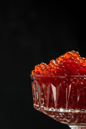 Caviar, A glass jar filled with red caviar, salmon caviar. Delicatessen. Gourmet food, Delicious food concept, selective focus, place for text,の写真素材