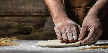 Kneading the Dough, hands making dough for pizza or bread.