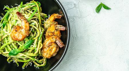 zucchini spaghetti with shrimp, Vegetarian vegetable low carb pasta, superfood concept. Healthy, clean eating. vegan or gluten free diet,の写真素材