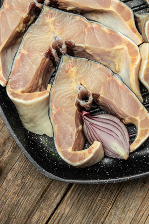 steaks of large raw sturgeon. Culinary, cooking, bakery concept. banner, menu, recipe place for...