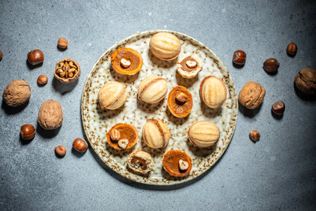 peanuts with condensed milk on plate. Peanut cookies. banner, menu, recipe place for text, top view.