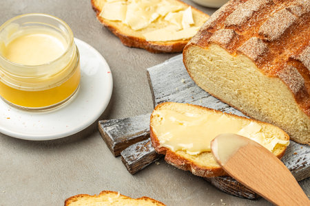 Bread, butter, cream sweetened condensed milk. Food recipe background. close up.の写真素材