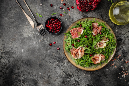 Jamon Prosciutto and arugula Salad, Christmas food tree Antipasto. Festive holiday food. Long banner format. top view.の写真素材