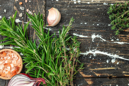 Fresh rosemary herb on a wooden background, banner, menu, recipe place for text, top view,の写真素材