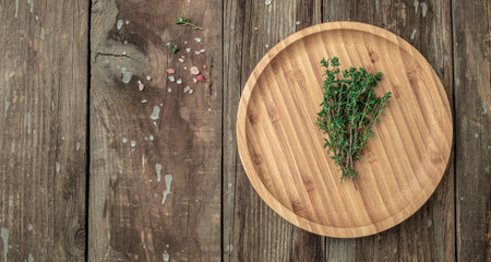 fresh thyme herb on a light background, banner, menu, recipe place for text, top view.の写真素材