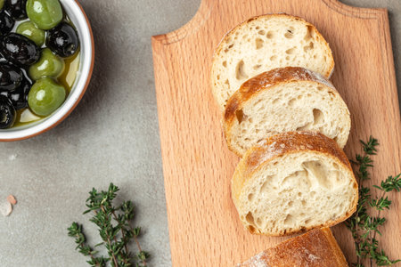 bread ciabatta and olives. banner, menu, recipe place for text, top view.
