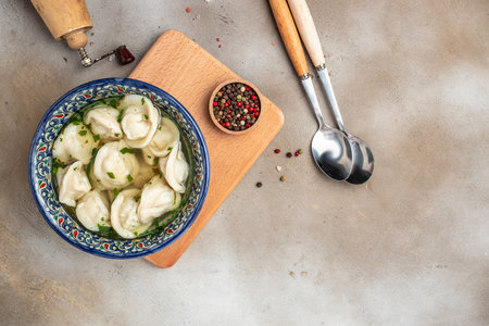 Dumplings in the soup chuchvara banner, menu, recipe place for text, top view. Uzbek food.の写真素材
