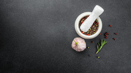 Mortar with spices, Cooking, culinary background with herbs, spices and utensils. top view,の写真素材