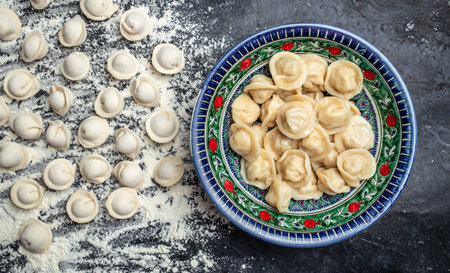 Homemade meat dumplings dumplings. Dumplings, filled with meat, ravioli on plate. Restaurant menu, dieting, cookbook recipe top view.の写真素材