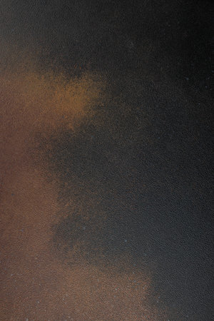 brown rusty stone or metal surface texture Grunge background, vertical image. top view. place for text.の写真素材