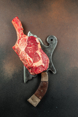tomahawk steak. Raw beef meat. place for text, top view.の写真素材