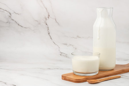 homemade yogurt, kefir, fermented milk on a light background. Healthy, clean eating. Vegan or gluten free diet.の写真素材