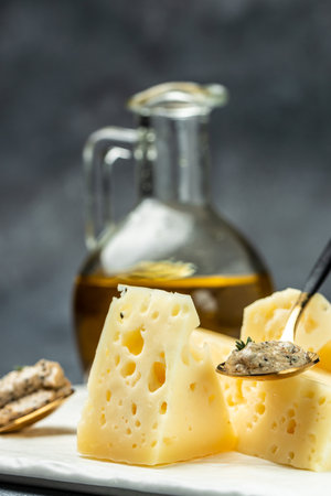 cheese with holes and truffle paste. Food recipe background. close up.の写真素材