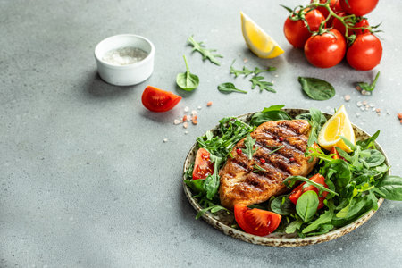 Grilled chicken breast with tomatoes and herbs, Healthy, clean eating. place for text, top view,の写真素材