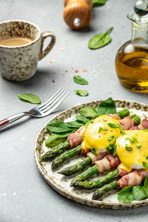 asparagus with bacon, poached egg and hollandaise sause. Food recipe background. close upの写真素材