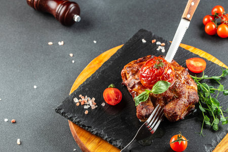 Grilled ribeye beef steak with tomatoes, Healthy fats, clean eating for weight loss. top view. place for text,の写真素材