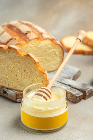 sandwich with honey and milk for breakfast. vertical image. top view. place for text.の写真素材