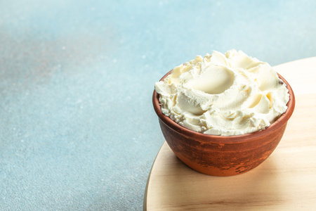 Bowl of cream cheese. Concept healthy and balanced eating. place for text, top view.の写真素材