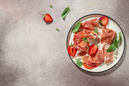 jamon strawberry on a light background. Restaurant menu, dieting, cookbook recipe top view.の写真素材