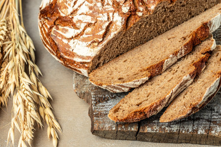 sliced bread. baked bread. Craft bakery on wooden board, banner, menu, recipe place for text, top...