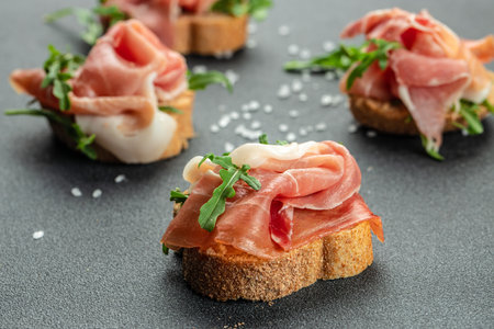 Open Sandwich with Prosciutto. Food recipe background. Close up.の写真素材