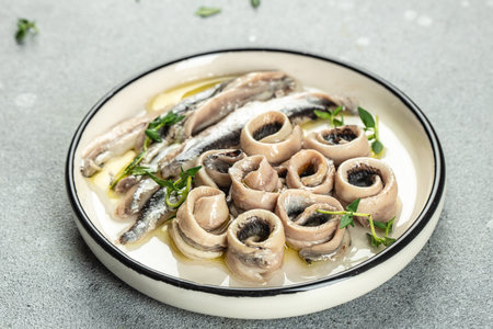 Anchovies marinated in vinegar with olive oil, Food recipe background. Close upの写真素材
