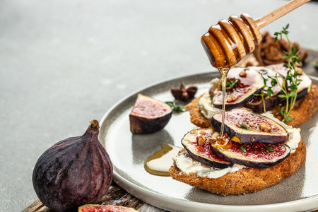 cheese and figs on rye bread toast, Restaurant menu, dieting, cookbook recipe top view,の写真素材