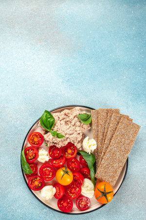 bowl of homemade liver pate with fig, Concept healthy and balanced eating. vertical image. top view. copy space for textの写真素材