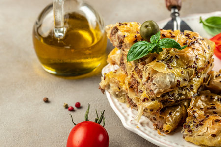 Rolled Burek savoury pie with meat. Restaurant menu, dieting, cookbook recipe top view.