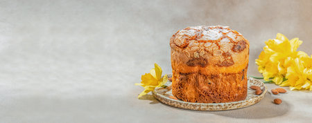 Delicious Easter cake with almonds flowers on light background.の写真素材